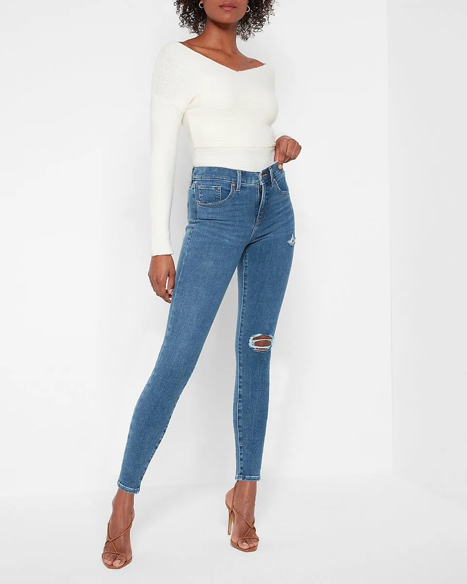 Mid Rise 4-Way Hyper Stretch Medium Wash Ripped Skinny Jeans in Medium Wash